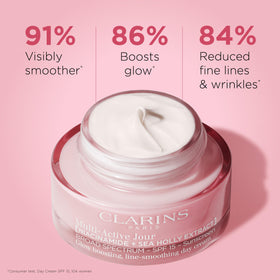 Clarins open jar texture showing lightweight cream and quick-absorbing finish