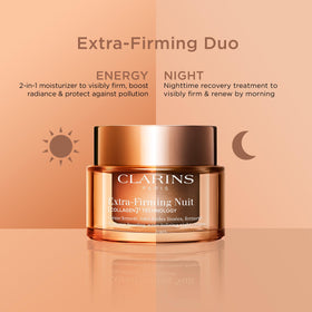 Clarins jar on bedside table in nighttime routine setting for restful recovery