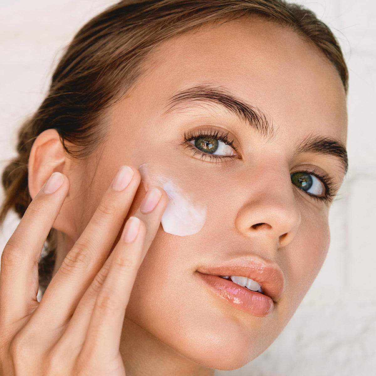 Clarins open jar top view revealing silky consistency and smooth application