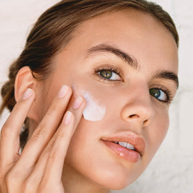 Clarins open jar top view revealing silky consistency and smooth application