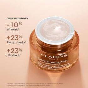 Clarins refill packaging beside jar showing eco-friendly refill option