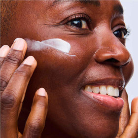 Clarins before and after skin image showing improved tone and density