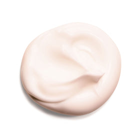 Clarins cream texture closeup highlighting rich shea and mango nourishment