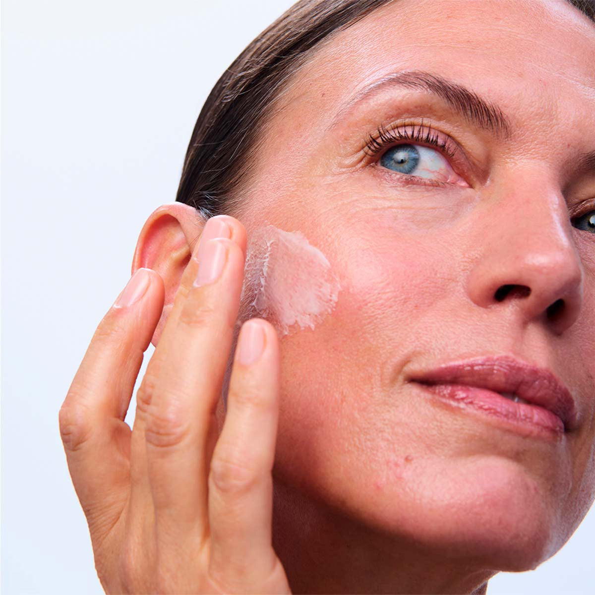 Clarins Super Restorative label close-up showing product name and targeted benefits