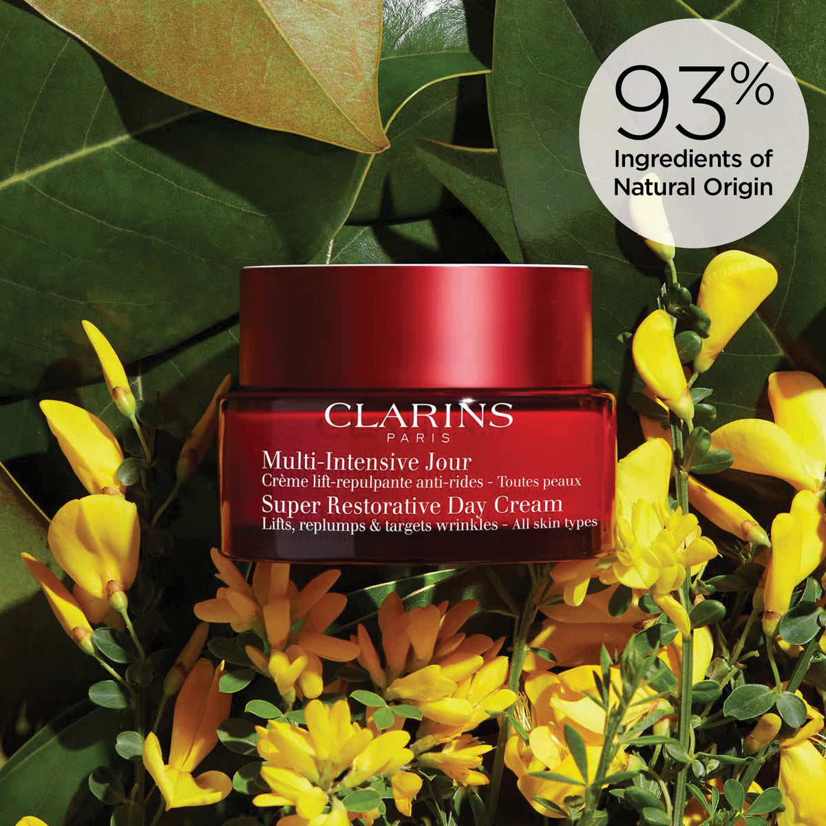 Clarins Super Restorative size shown in hand to indicate jar scale and easy dispensing