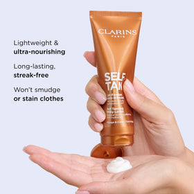 Clarins milky lotion texture in hand demonstrating smooth, fast-absorbing formula benefit
