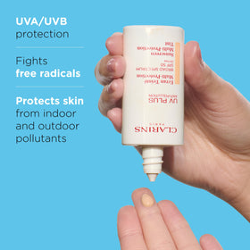 Clarins UV Plus texture close-up highlighting lightweight, hydrating formula benefit