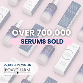CLEAN SKIN CLUB bottle staged with moisturizer and SPF to show routine compatibility