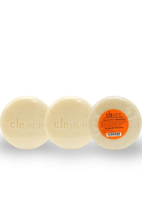 Cleure bar on bathroom shelf in neutral setting conveying mild, fragrance-free routine