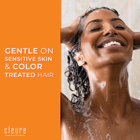 Cleure in-bathroom use with lathered hair showing gentle cleanse and sensitive-skin benefit