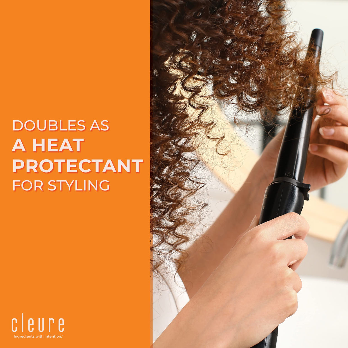 Cleure being sprayed on wet hair to detangle and reduce frizz