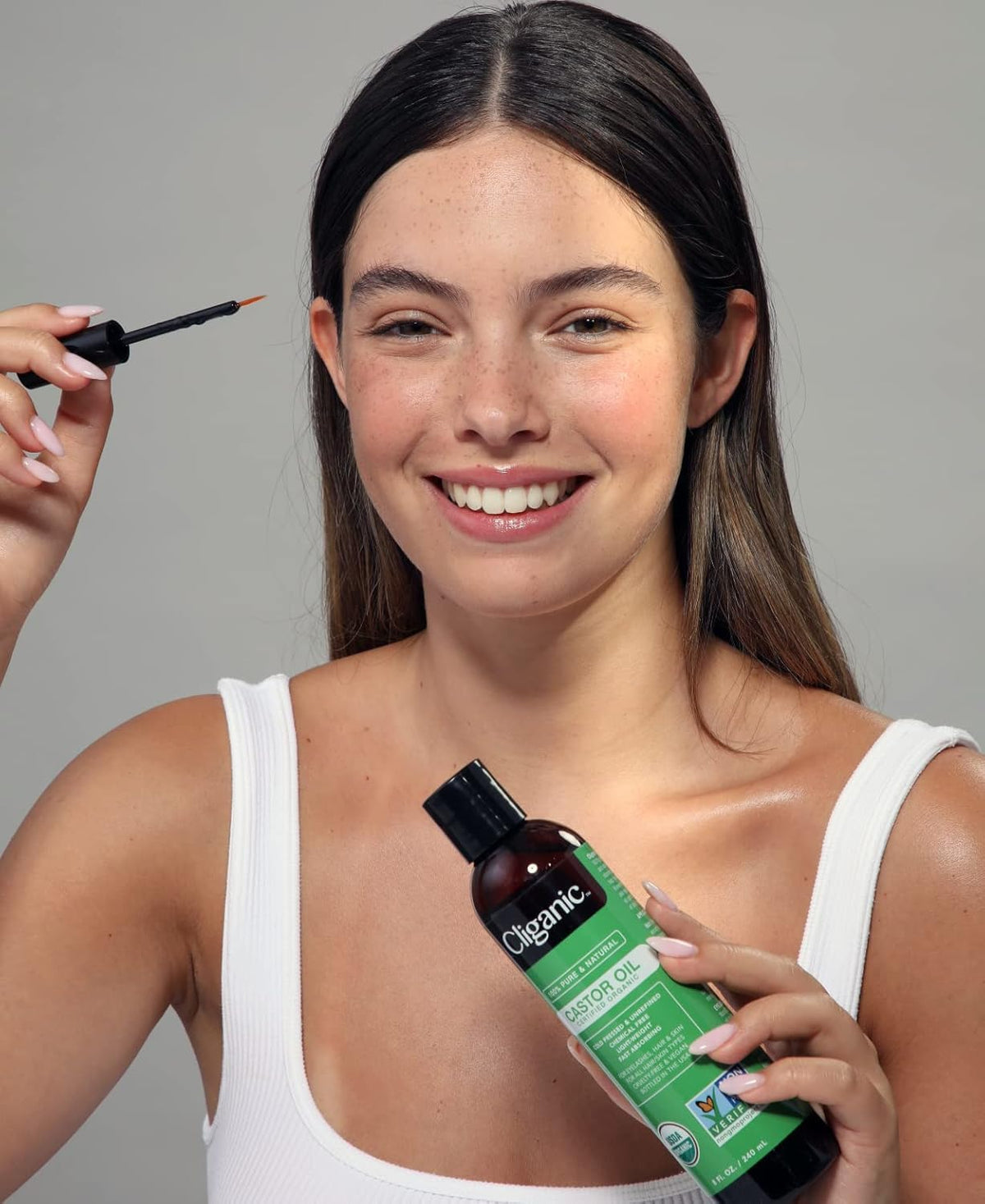 Cliganic eyelash wand and liner brush demonstrating precise application