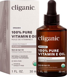 Cliganic front bottle showing vitamin E oil label and purity benefit