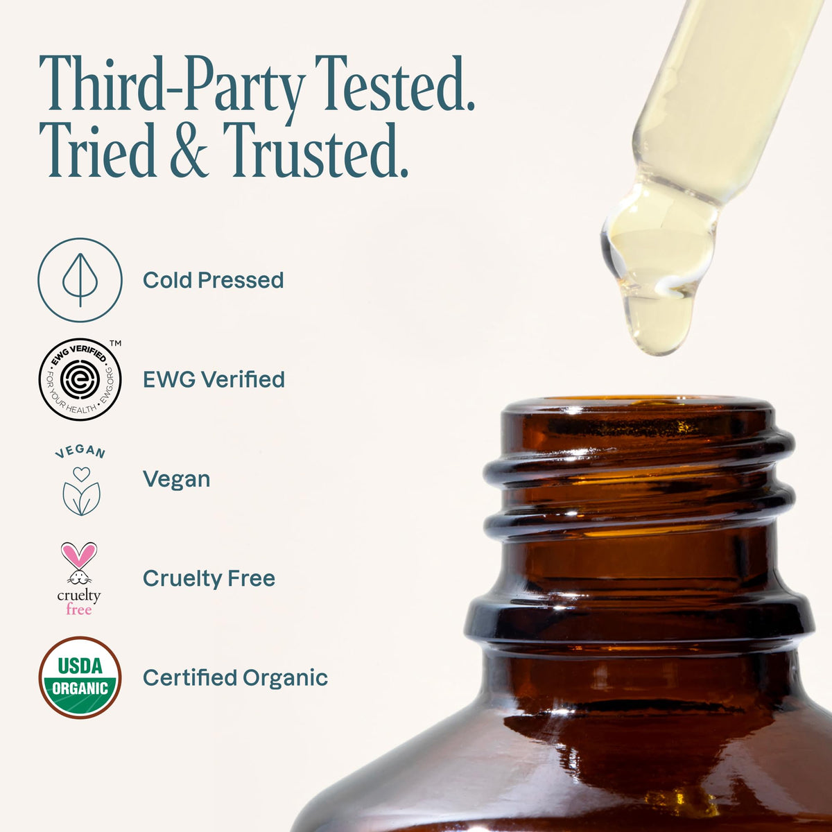 Cliganic oil drop on hand texture shot demonstrating lightweight absorption benefit