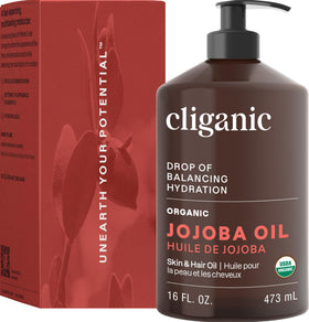 Cliganic jojoba oil applied to hair ends demonstrating frizz control benefit