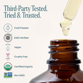 Cliganic oil applied to hair and skin in lifestyle scene for nourishment benefit
