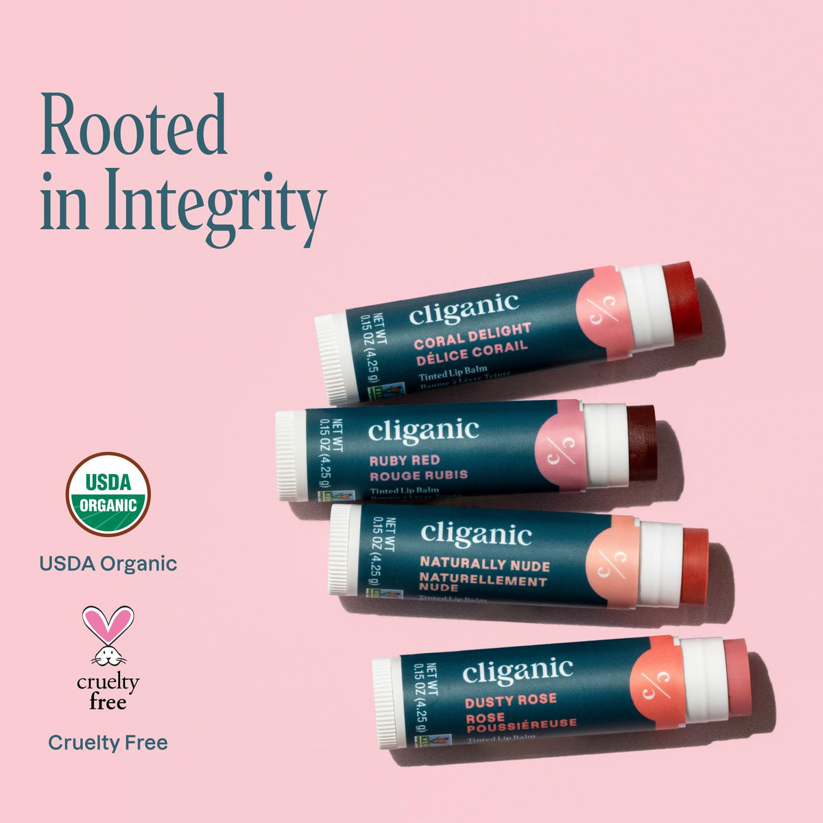 Cliganic next to coin for size comparison, showing travel-friendly, pocketable design
