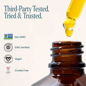 Cliganic bottle beside a ruler showing compact 30ml scale for travel-friendly use