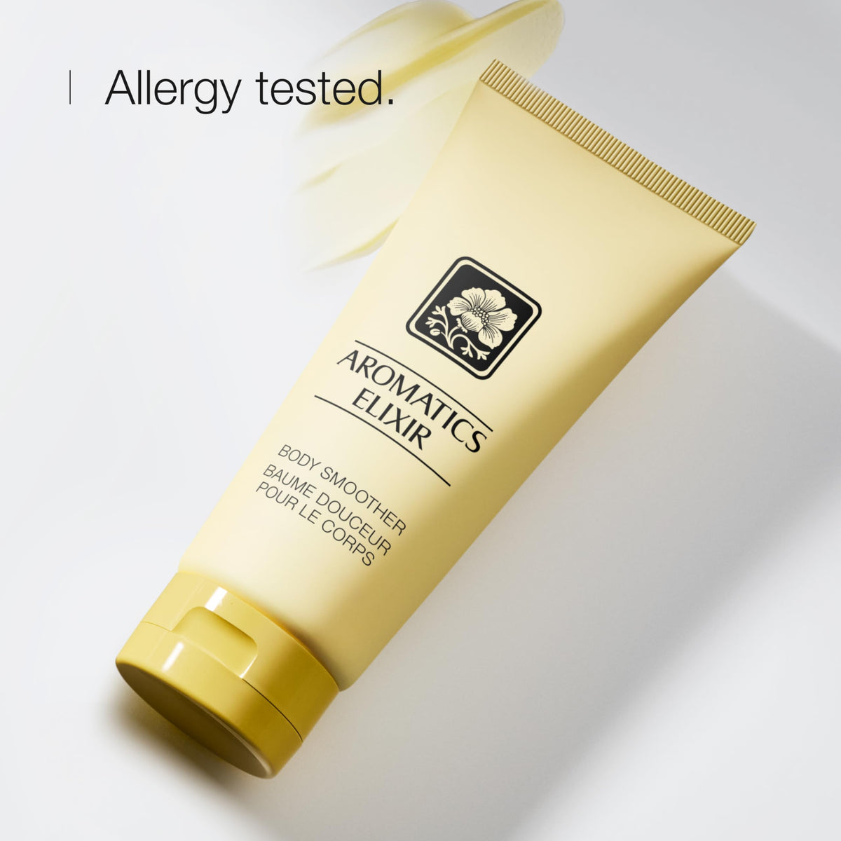 Clinique Aromatics Elixir in hand being applied to arm demonstrating easy absorption
