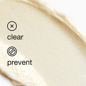 Clinique applying solution to nose demonstrating targeted blackhead removal