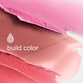Clinique Chubby Stick swatches on arm showing shade Grandest Guava and layering potential