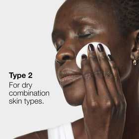 Stream of lotion pouring onto cotton pad showing Clinique easy application