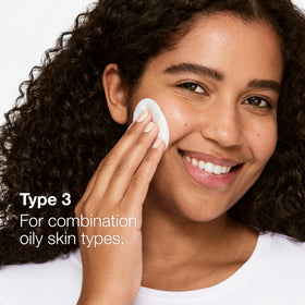 Clinique clear lotion texture drop closeup showing lightweight exfoliating finish