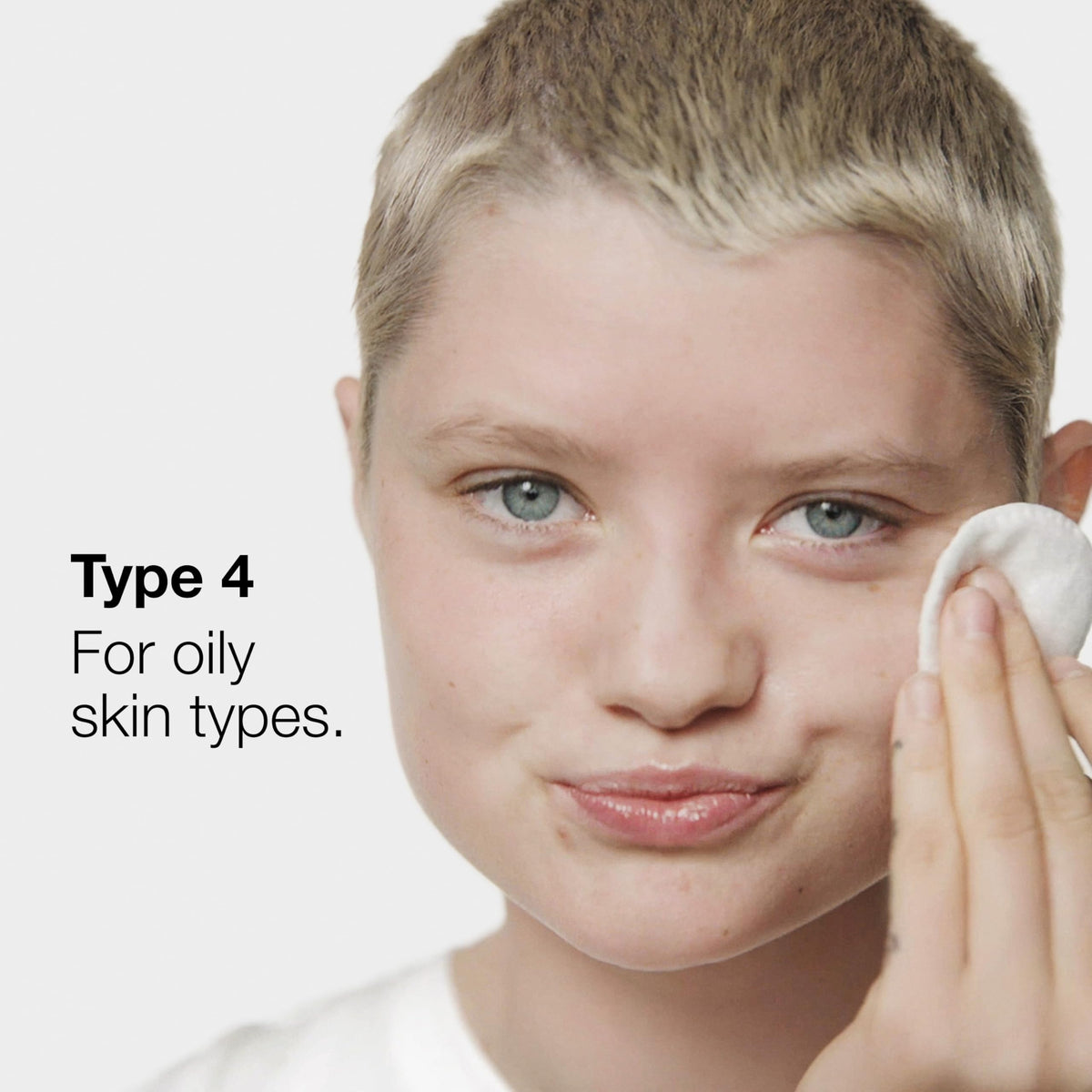 Clinique Clarifying Lotion 4 on cotton pad demonstrating easy application and oil removal