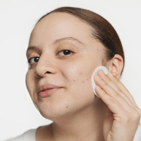 Clinique bottle label detail showing formula information and skin-type guidance