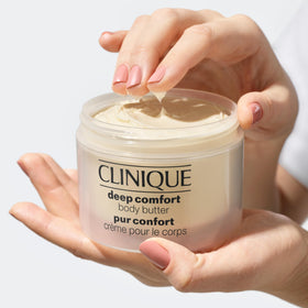 Clinique being applied to elbow demonstrating smoothing and comfort benefit