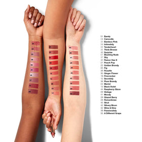 Clinique lipstick held in hand for scale showing travel-friendly size and convenience