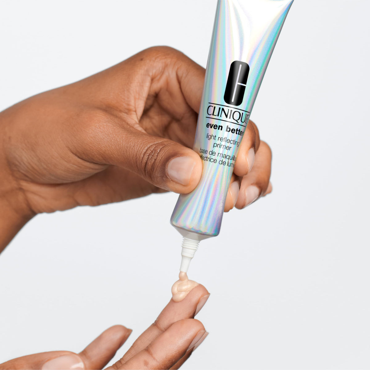Clinique primer scale and size comparison with 1 fl oz bottle for reference