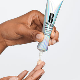 Clinique primer scale and size comparison with 1 fl oz bottle for reference