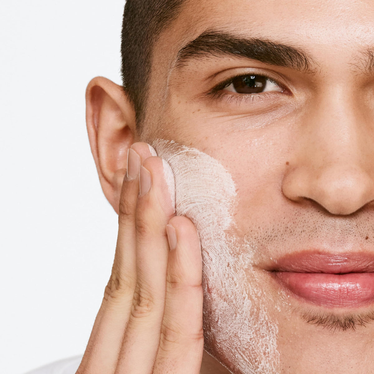 Clinique face wash in hand demonstrating application and quick rinse benefit