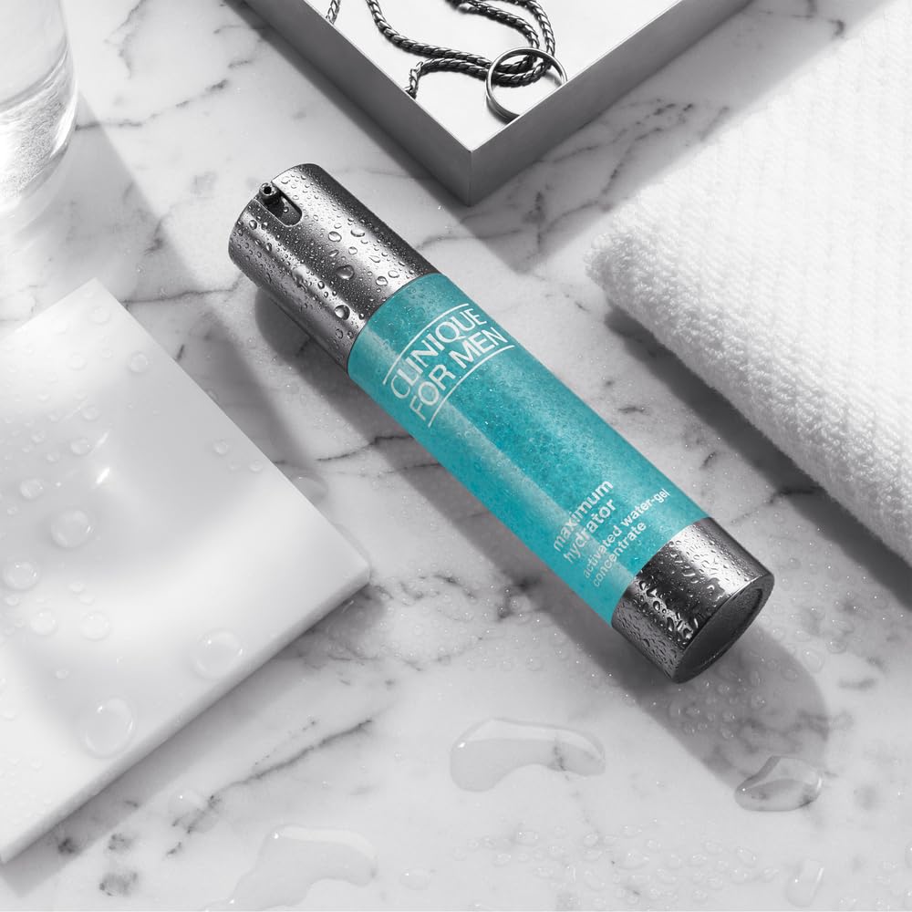 Clinique jar held in hand for scale demonstrating portable 1.6 fl oz convenience