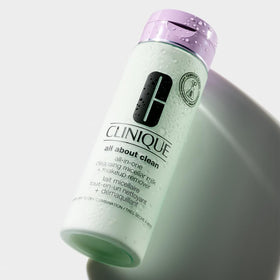 Clinique in-use shot removing eye makeup with cotton pad for gentle cleaning
