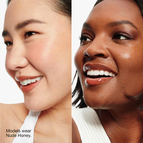 Clinique lip application on model demonstrating glossy, conditioned result