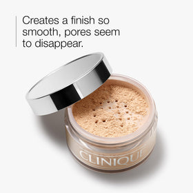 Close-up of Clinique loose powder texture highlighting superfine, silky particles for smooth finish