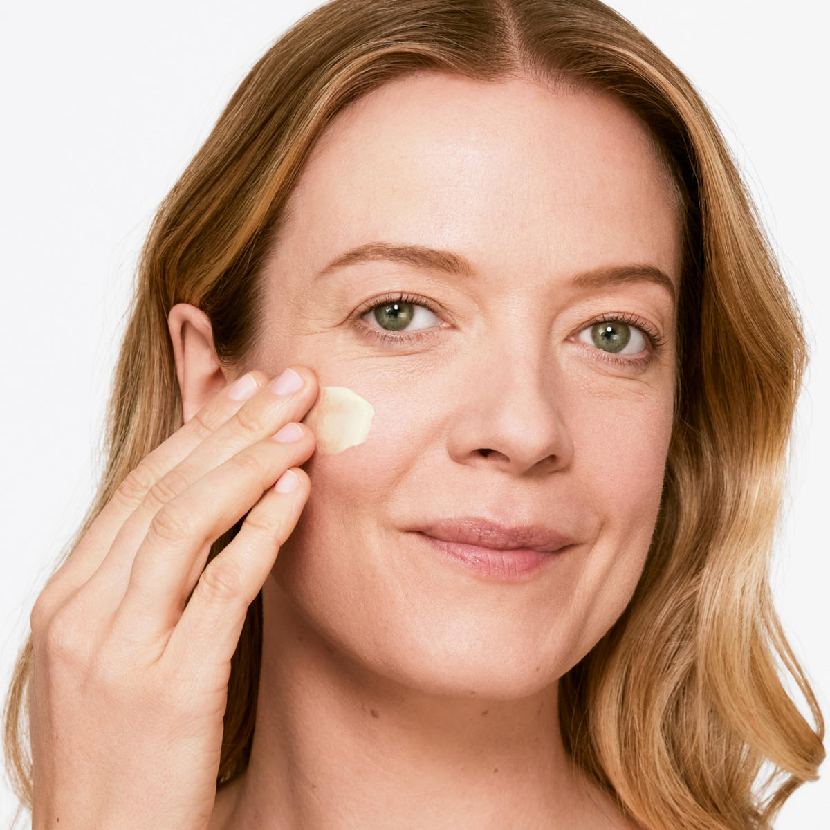 Clinique moisturizing cream applied on hand demonstrating smooth absorbency and comfort