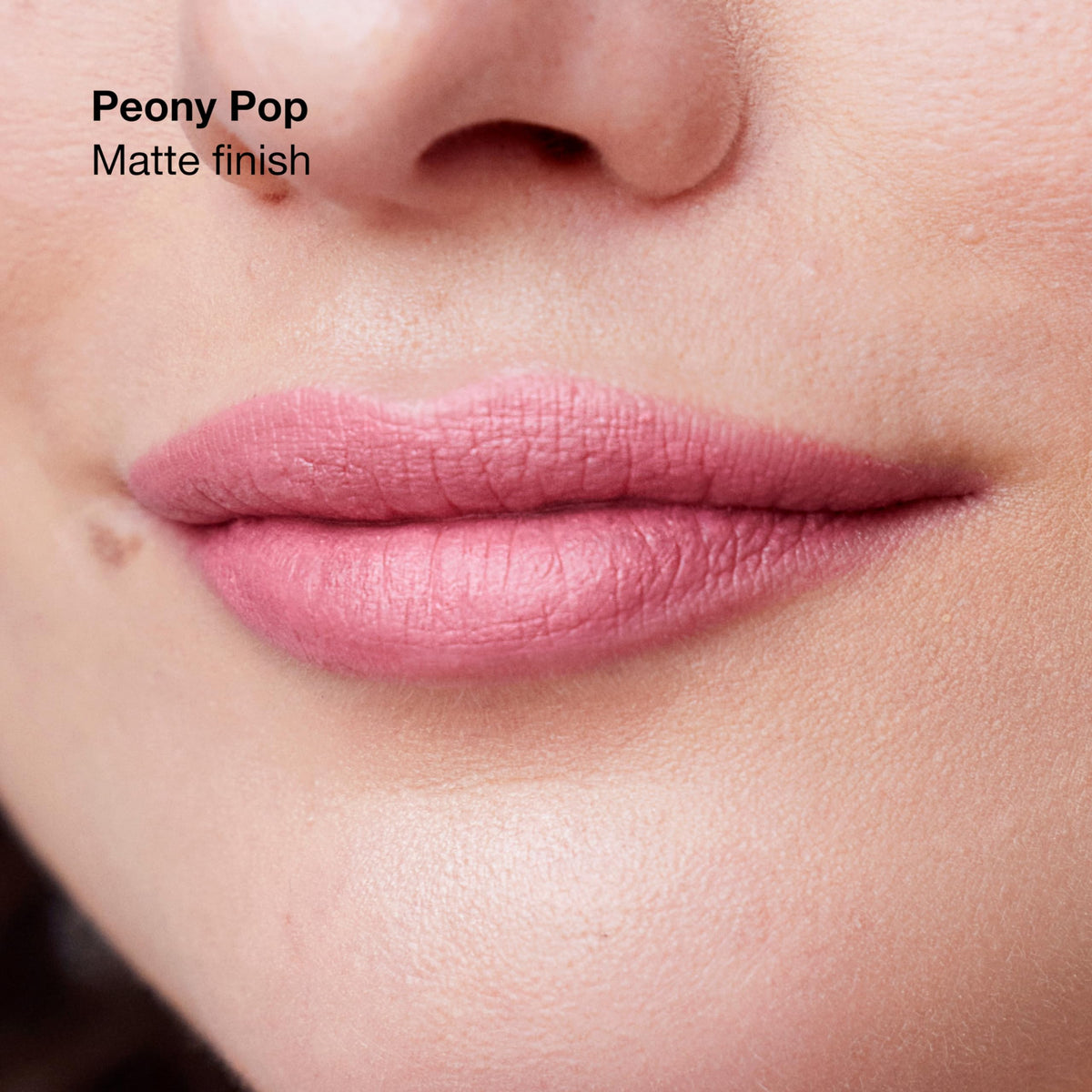 Clinique texture close-up swipe of lipstick, demonstrating smooth primer glide