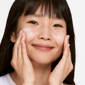 Clinique moisturizer dispensed in hand illustrating easy absorption benefit