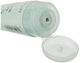 Clinique scrub in use on hands demonstrating gentle exfoliation and refreshed skin appearance