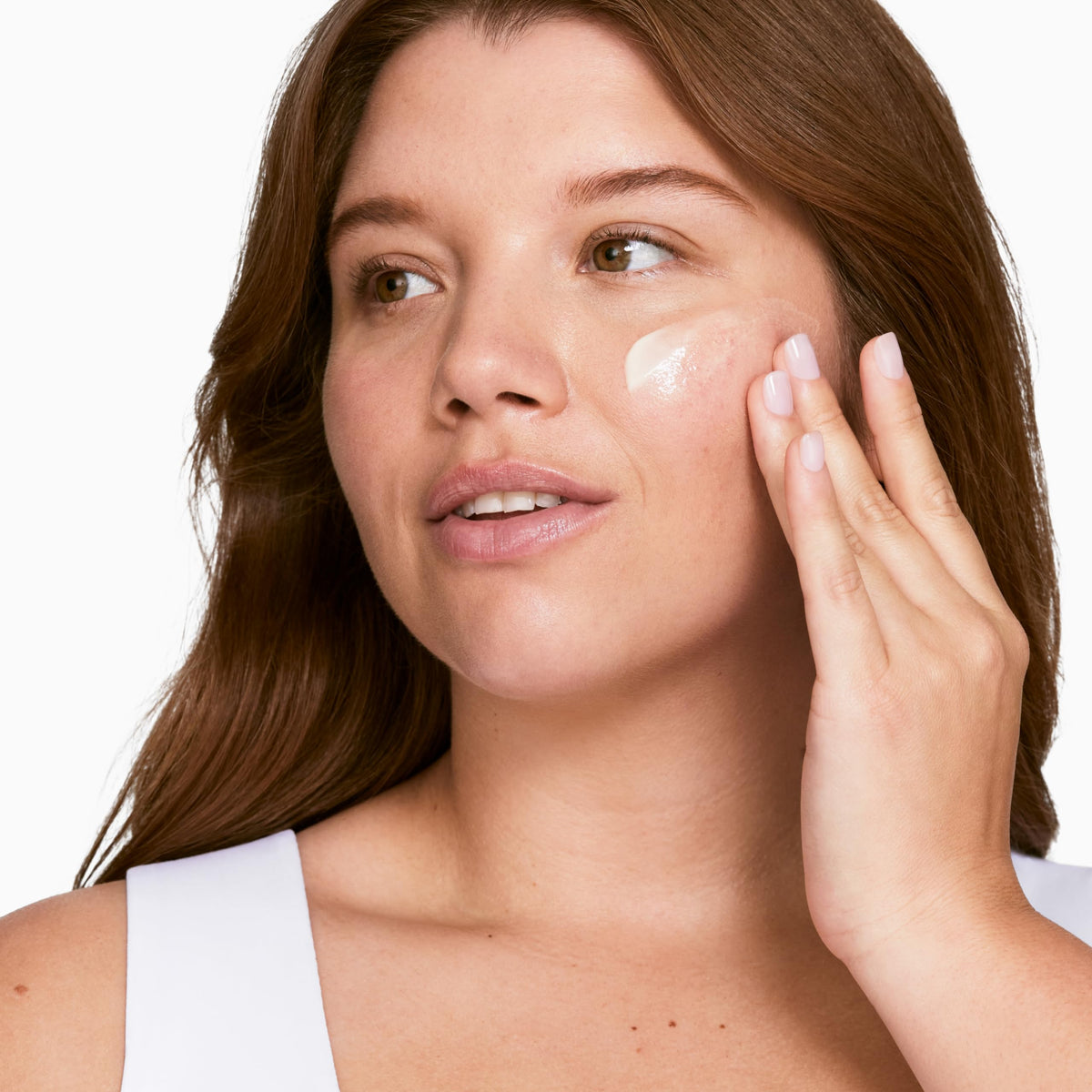 Clinique 200ml bottle held in hand to show size and generous product value