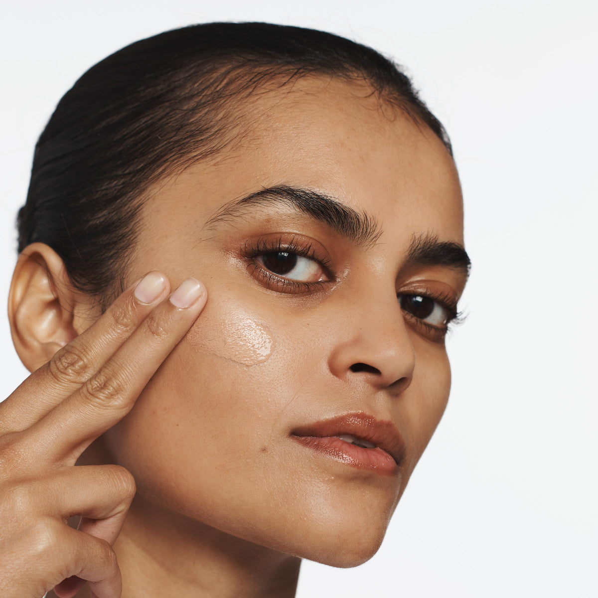 Clinique texture closeup of foundation droplets, shows silky hydrating formula