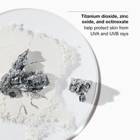 Clinique Superdefense held in hand to show 1.4 fl oz scale and travel-friendly convenience