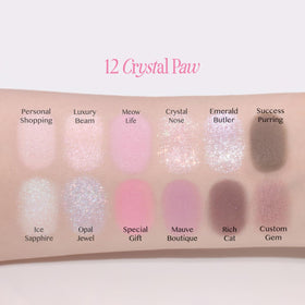 CLIO PROFESSIONAL palette in hand to show size and portability for on-the-go makeup