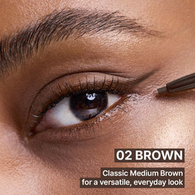 CLIO PROFESSIONAL brown swatches on arm demonstrating rich payoff and smudge-resistant finish