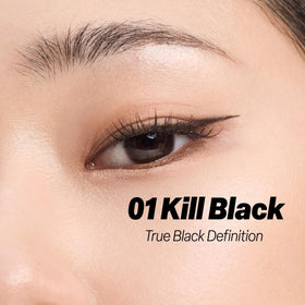 CLIO one-stroke black line on skin demonstrating even pigment payoff