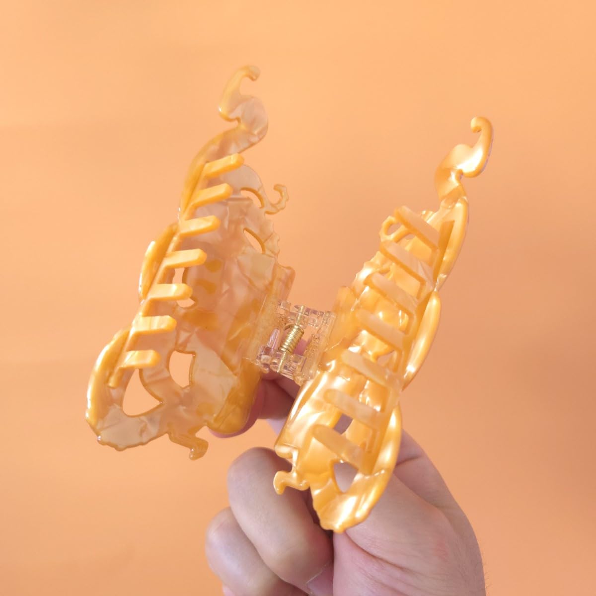 Clip Sugar octopus clip styled with summer outfit for playful accessory appeal