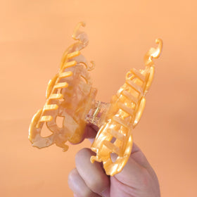 Clip Sugar octopus clip styled with summer outfit for playful accessory appeal